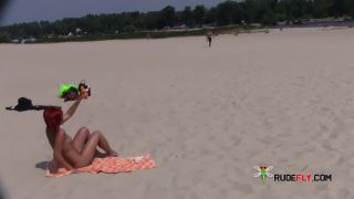 Amateur make fun at a nude  beach