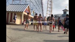 Amazing tattooed girl at water park entrance