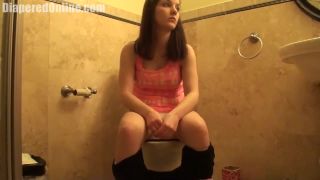 Diaperedonline2Taylor P Taylor Wets Diaper on Toilet