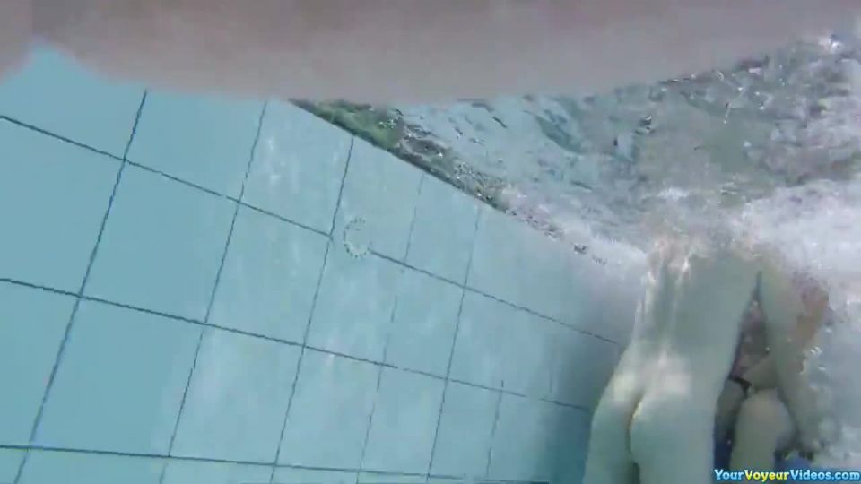 Handjob in nudist pool