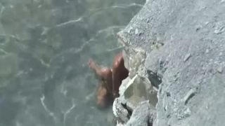 Couple fucking in the  water