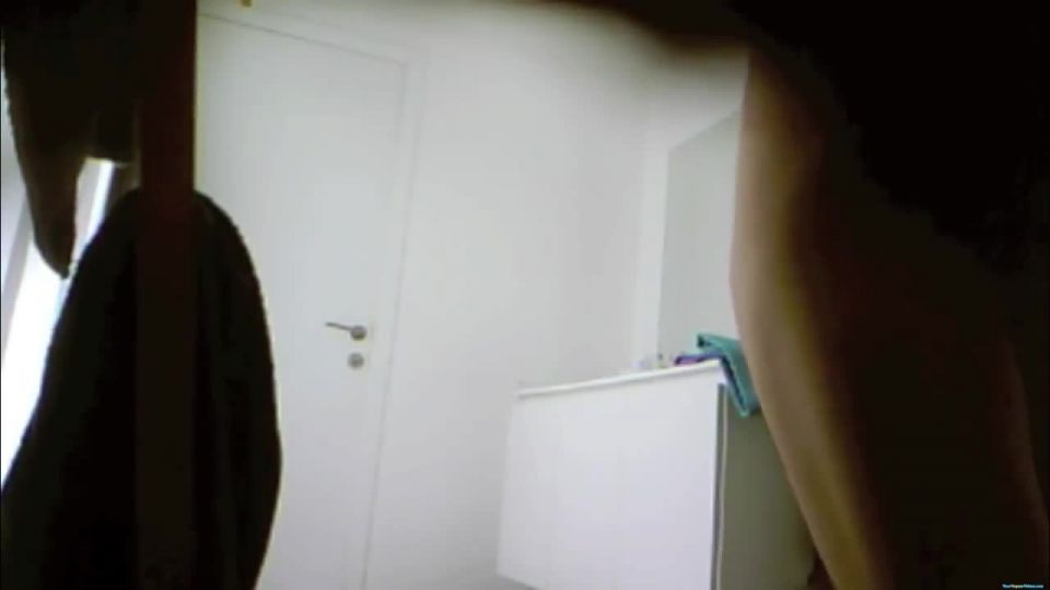 Busty teen spied in bathroom