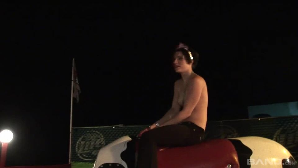 Three Topless Brunettes Ride A Mechanical  Bull