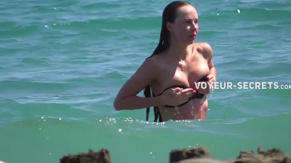 Undeniably the hottest girl on the beach today Voyeur!