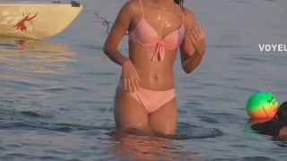 Wet teen girl nearly loses her bikini