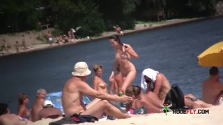 Busty sexy chicks group on naturist strand  3