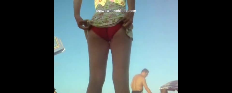 Upskirt with no panties on the beach voyeur 