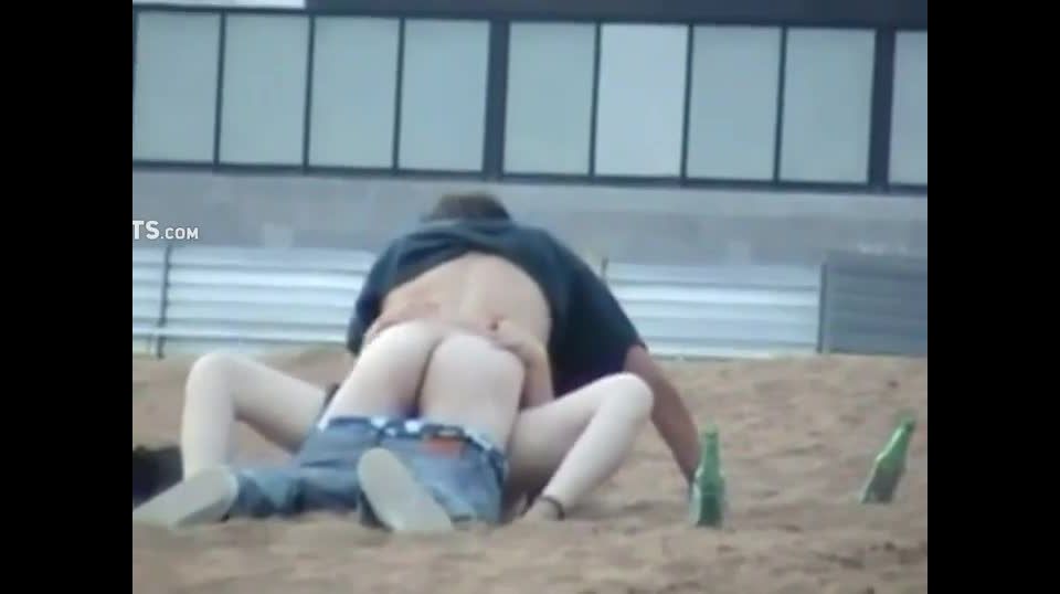 Teen couple fucking at a  beach