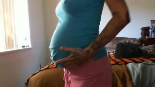 Tattooed pregnant bitch strips for the webcam