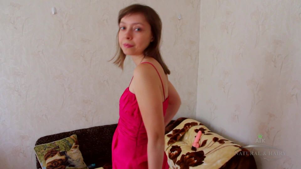 Russian 2042-Sabrina smiles as she plays with her hairy pussy
