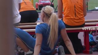 Sexy athlete stretching before competition Voyeur