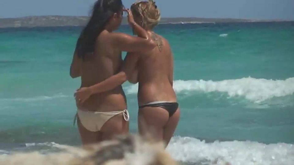 Lesbian girls cuddling on beach Lesbian