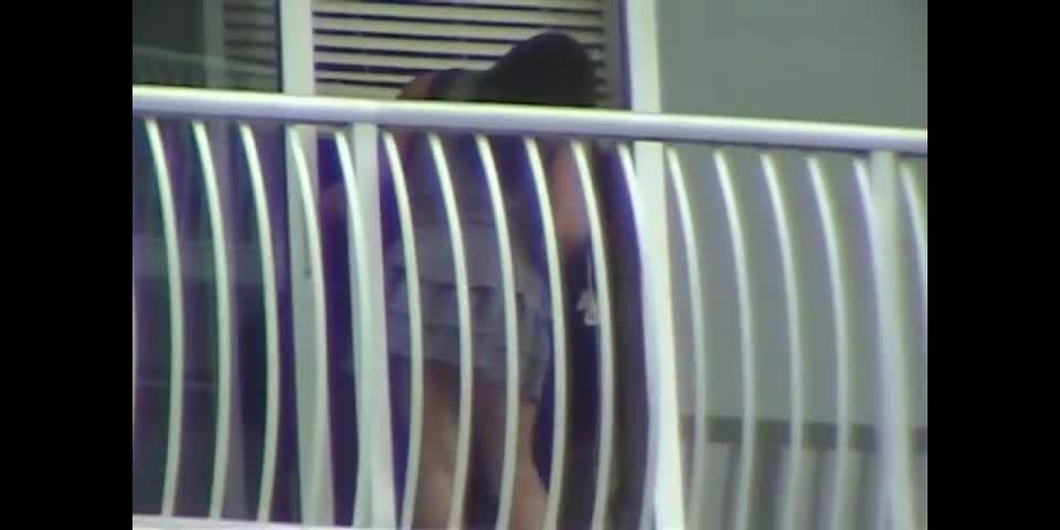 Ebony upskirt on the  balcony