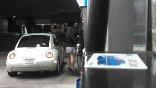 Luxurious babe on the gas station