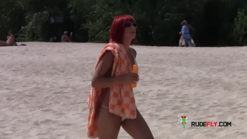 Guy spreading ass on nude  beach