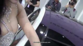 The chinese motorshow model didn't realize that her nipple was visible to all the people   960