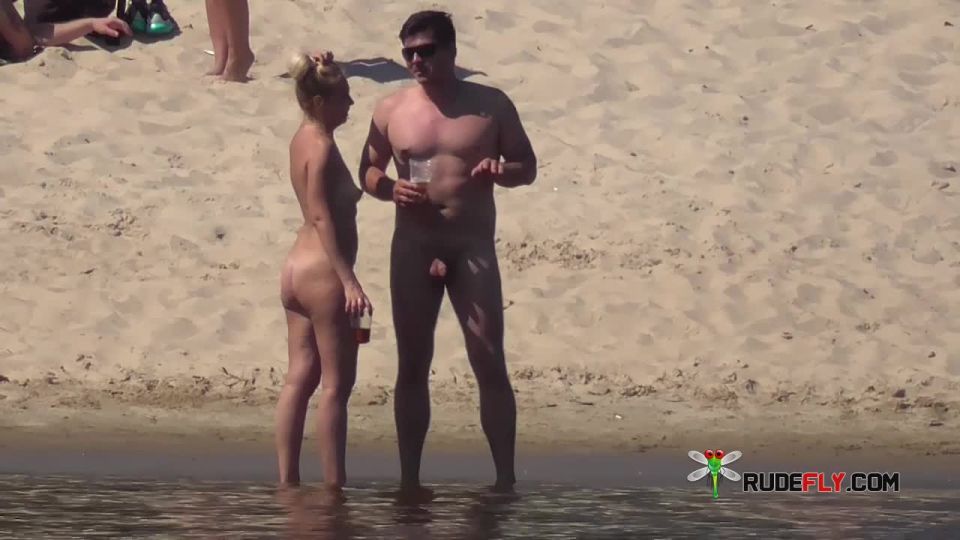 Slim teen with perky boobs naked at a nudist beach  3