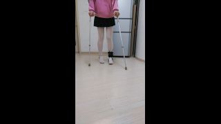 Chinese girl tries different pantyhose over her bandaged ankle