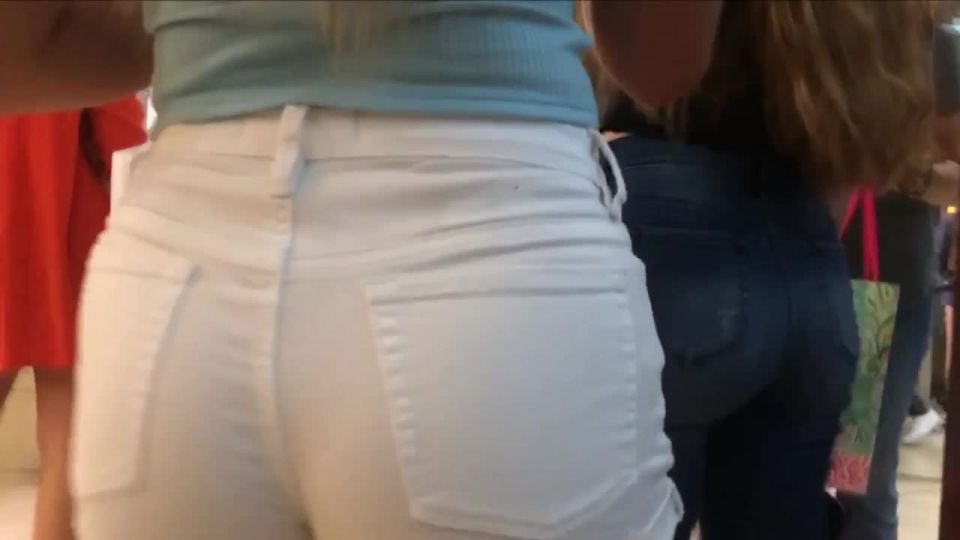 Teen in white shorts bends over across the table Voyeur!