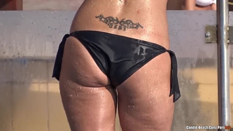 Sexy bikini milfs tanning at the pool!