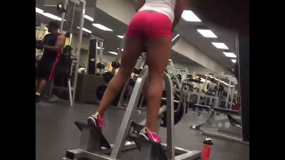 Girl working out in a  gym