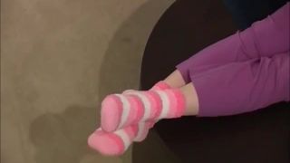 Foot Mistress makes her foot slave sniff her socks and lick her feet.