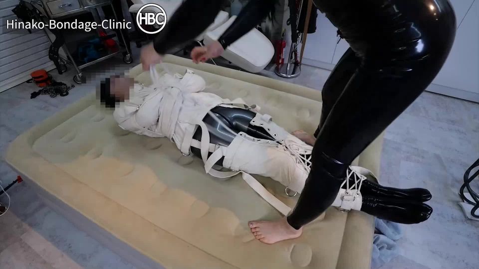 Femdom Stream – Hinako Bondage Clinic – Taped Down to the Bed in a Latex Cat Suit and Canvas Straitjacket - Humiliation