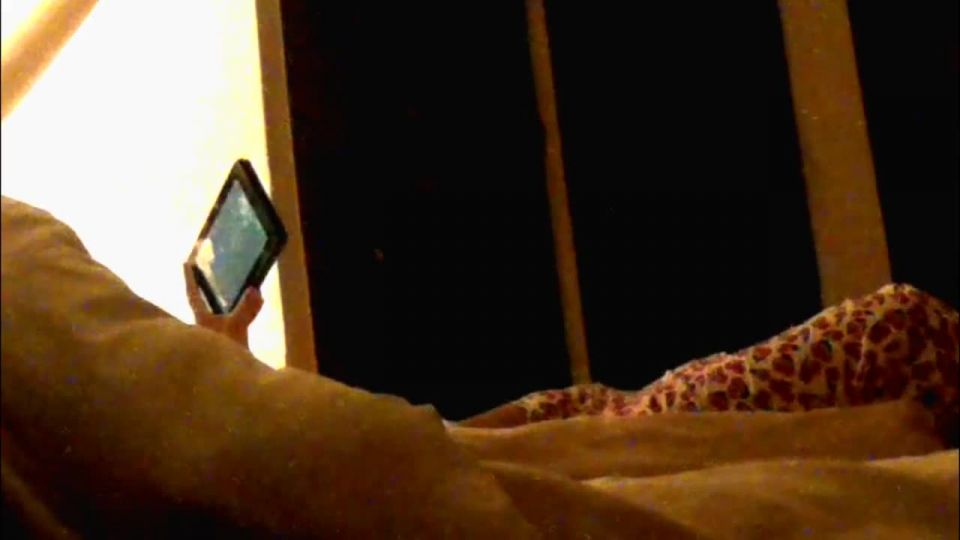 Wife watching phone porn and fingering pussy. hidden cam