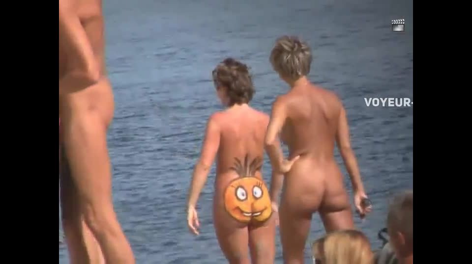 Funny smiling pumpkin on a naked ass Nudism!