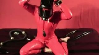 HotFetLife - Unknown - Skinny Rubber Fetish Girl with Red Latex Catsuit and Gasmask Masturbates