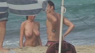 Stunning girl gets naked on beach Nudism!