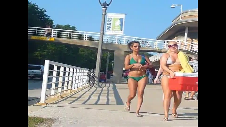 Sexy girl walking towards the  beach
