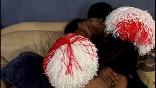 Ebony cheerleader shakes pom poms and fucks Black!