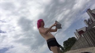 Punk girl changes her top in public