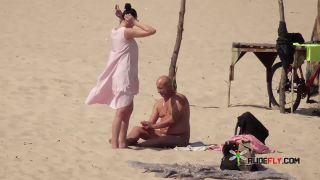 Molesting and taking video of my friend on a nude plage  at