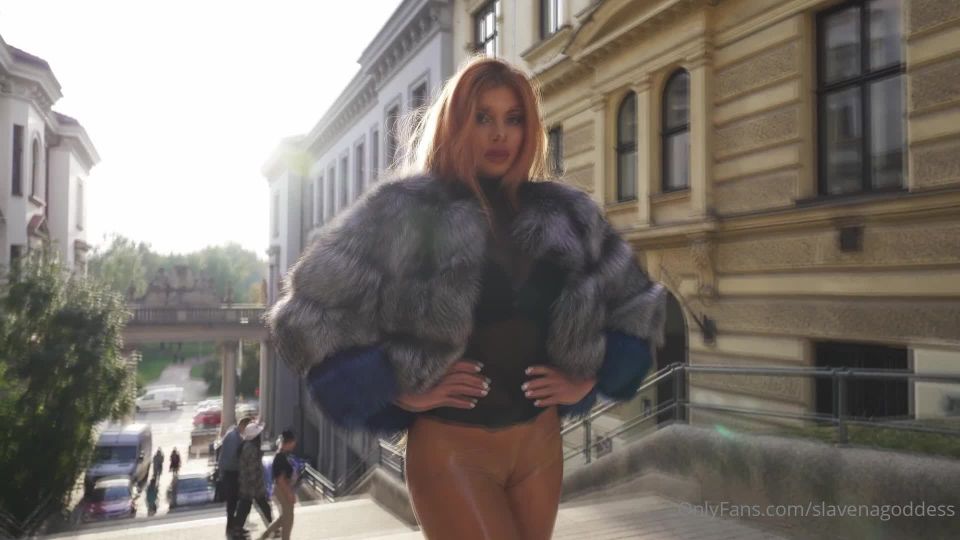 Goddess Slavena walking in glossy tights.