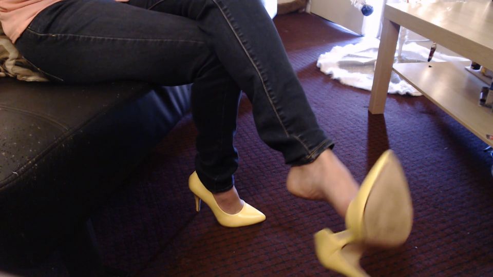 Double Crossed Yellow Pumps Dangling