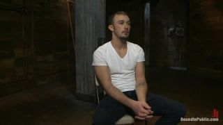 Stud in a metal cage is fucked by horny bar patrons Hairy