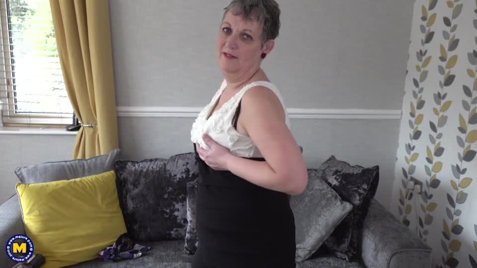 Marika is an older lady that loves to play with her wet shaved pussy when shes alone at home