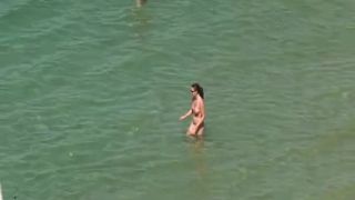 Topless women at beach