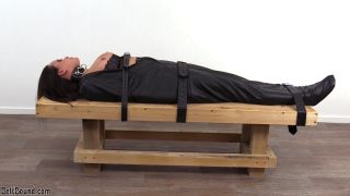 Belt Bound – Lori strapped in a body bag - Beltbound