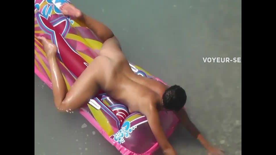 Amazing ass with tan lines in the water Nudism!