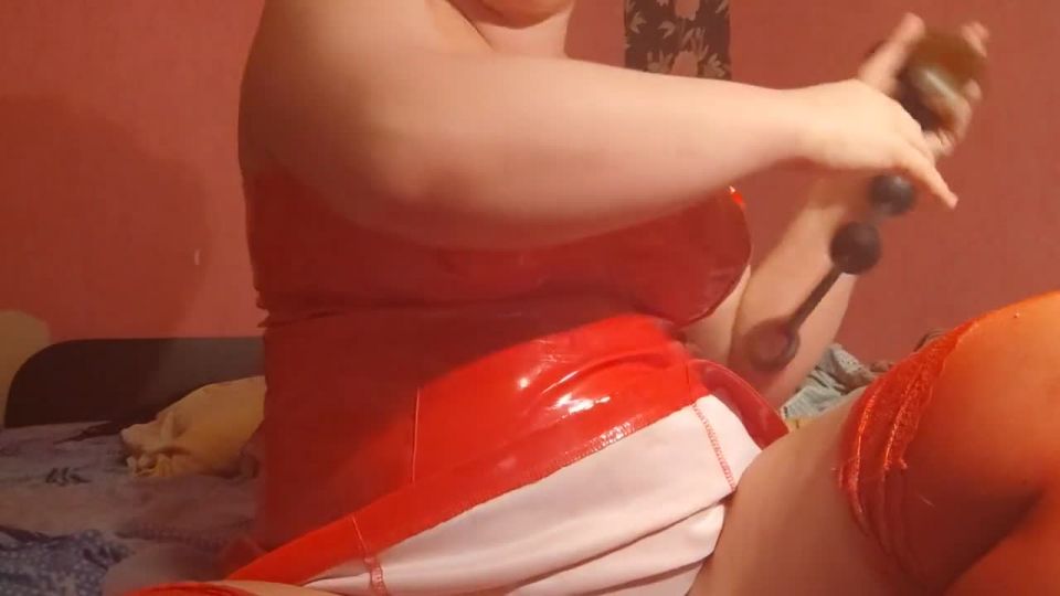 Nasty bitch in red latex and high heels