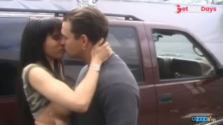 A thin brunette with big tits rides cock and gets titty fucked in the back of a Chevy.