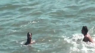 Nudist women in the water