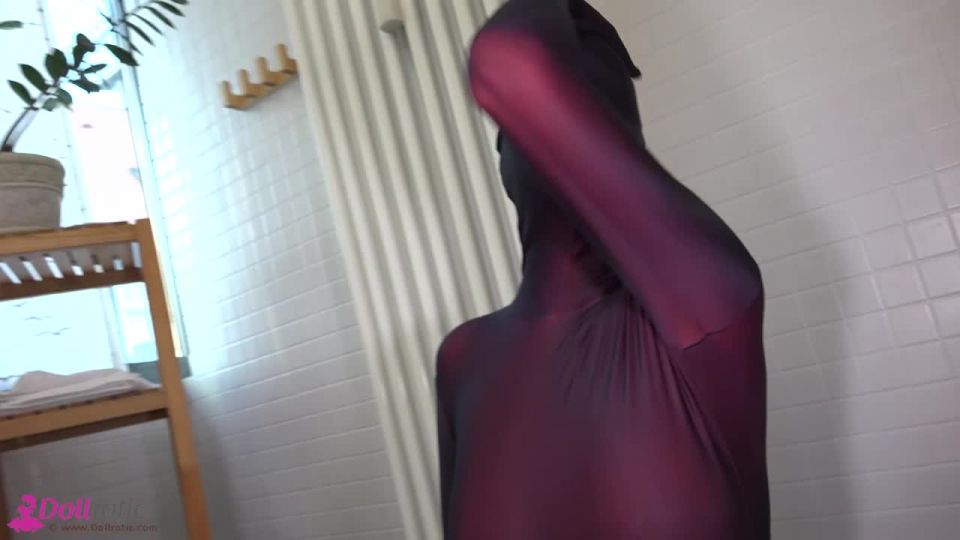 Spandex doll taking a shower