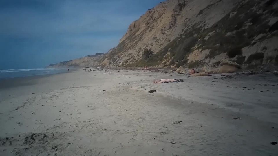 Two nudist friends recorded on scarce naked beach