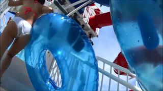 Close look at ripe young ass on water slide