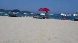 Secret view as she rubs pussy on a beach public 