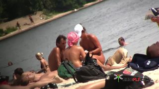 A public strand heats up with two hot teen naturists  3